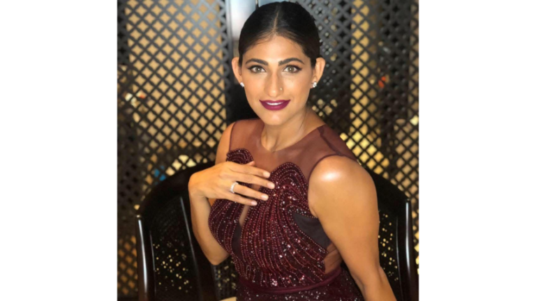 Kubbra Sait in Chocolate outfit