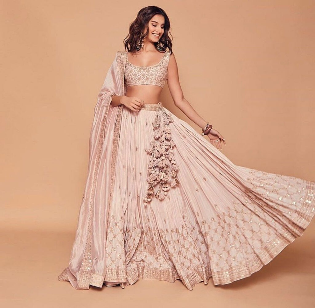 Tara Sutaria Looks Stunning In A Light Pink Lehenga